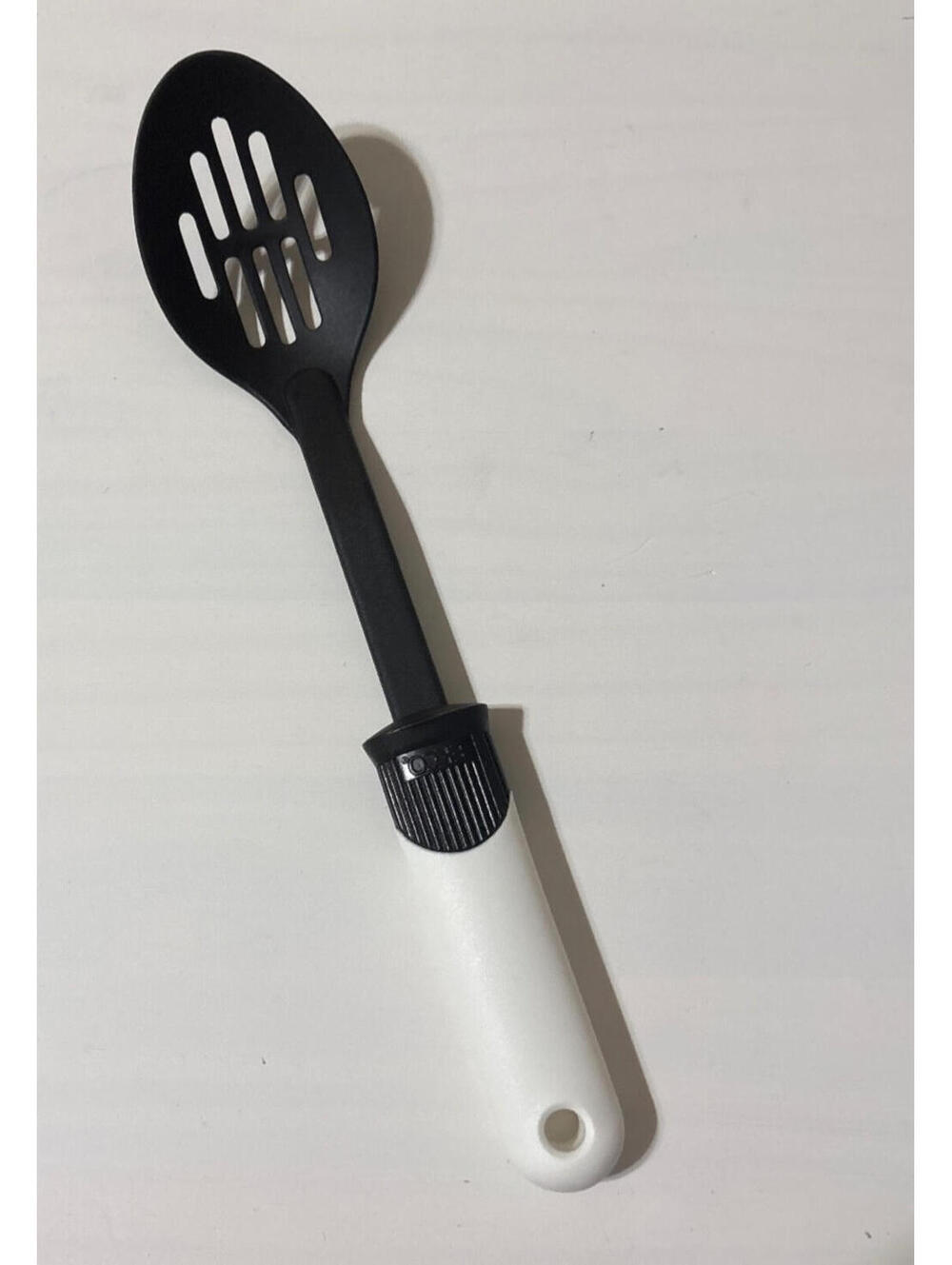 Vintage ekco slotted spoon black and white